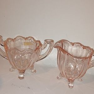 Pink pressed glass creamer and sugar dish set. Indiana glass?